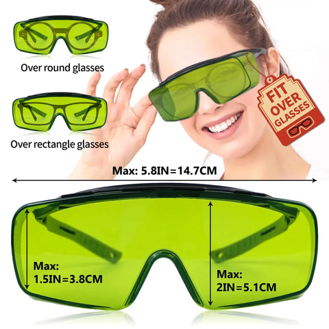 Heavy Duty Laser Safety Glasses Delivering Straight Up Optical Density Blocking For Blue Violet And Infrared Lasers Dual Band Industrial Eyewear with green lenses fitting over other glasses.