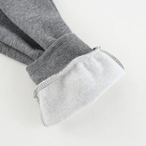 Close-up of grey cuff detail on Three Pack Boys Sweatpants Fleece Joggers With Zipper Pockets Cozy Everyday Lounge And Gym Class Ready.