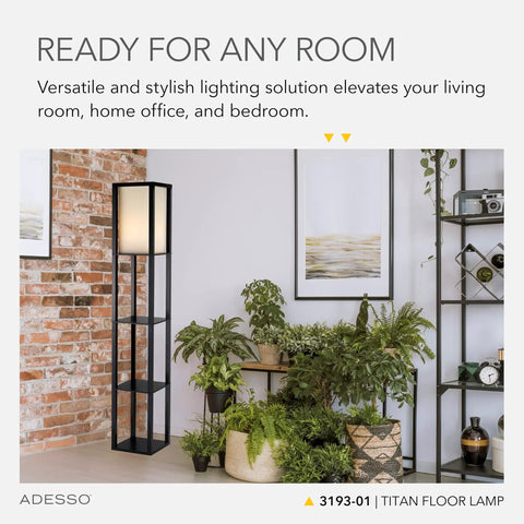 Tall Square Floor Lamp With Three Tier Open Shelves And Black Base Featuring Soft Fabric Shade next to a brick wall in living room.