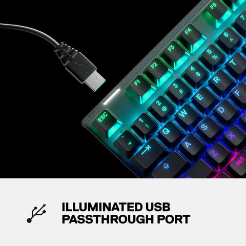 Top Tier Mechanical Gaming Keyboard Featuring Integrated OLED Display USB Passthrough Media Controls Heavy Duty Aluminum Housing Tactile Clicky Blue Switches Full Spectrum RGB Lighting For Gamers close-up on illuminated USB passthrough port.