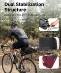 Cyclist using Expandable 13L-15L Waterproof Bikepacking Saddle Bag for Road, Mountain, and E-Bikes with Roll-Top Closure, anti-slip features.