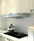 Modern kitchen with 5 Sheet Peel And Stick Backsplash Tiles 12 By 12 Inch Subway 3D Wall Panels In White With Gray Grout above stove.