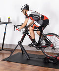 Cyclist using Portable Magnetic Bike Trainer Stand With Adjustable Resistance For Indoor Cycling, Foldable Aluminum Alloy Frame
