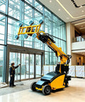 Rock Solid Heavy Duty Mobile Vacuum Glass Lifter With Hydraulic Suction Cups lifting large glass panel indoors with operator present.