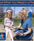 KeepGoing Kids Travel First Aid Kit pouch handed to girl on park swing; nurse-approved badge visible.