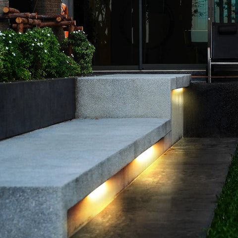 8 Pack Outdoor LED Hardscape Lights For Steps Retaining Walls And Decks, 7 Inch Paver Lights illuminating concrete steps