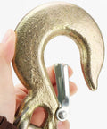 Close-up of a hand holding a 2 Pack 1/2 Inch G70 Forged Steel Clevis Grab Hook With Safety Latch, zinc plated.
