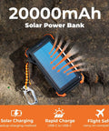 Beast Power Bank 20000mAh with solar charging on rocky surface, orange trim, built-in carabiner, flight-safe features.