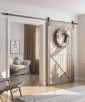 Interior view showing 10FT Sliding Barn Door Hardware Kit, Heavy Duty Track-Smoothly and Quietly-Includes Detailed Installation Instruction Fit 60" Wide Door Panel (J Shape Hanger) Black installed on wooden door.