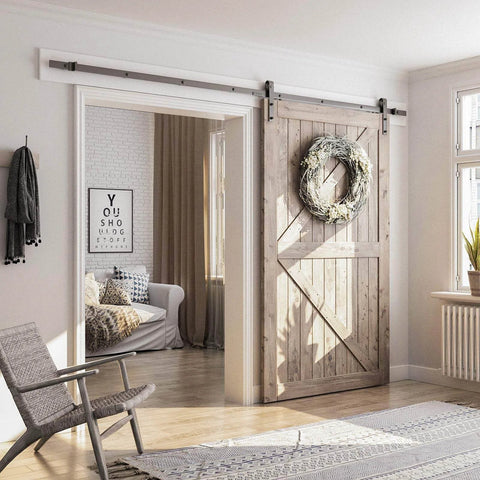 Interior view showing 10FT Sliding Barn Door Hardware Kit, Heavy Duty Track-Smoothly and Quietly-Includes Detailed Installation Instruction Fit 60" Wide Door Panel (J Shape Hanger) Black installed on wooden door.