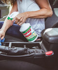 Person cleaning car interior with Heavy Duty Cleaner Degreaser And Disinfectant All In One For Kitchens Bathrooms Tools Engines Vinyl Stainless Steel