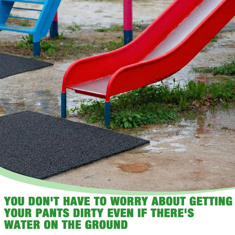 Heavy Duty Playground Rubber Mat 48 By 48 Inches Non Slip Outdoor Safety Pad placed under red slide on wet ground