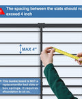 Heavy Duty Queen Bunkie Board Featuring Top Notch High Density Polymer Support showing slat spacing measurement with tape.