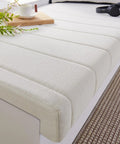 Straight Up Solid Custom Size Hearth Cushion With Extra Thick Foam Padding For Baby Safe Fireplace Edge Protector And Non Slip Window Bench Seat Cover For Cozy Indoor Furniture Armor on a white cushioned surface.