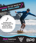 Person skimboarding on water with Shaka 35 Inch Skim Board With Epoxy Coated Wood Deck And Traction Pad No Wax Needed