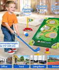 Young child playing with Toddler Golf Set for 2 3 4 5 Year Old Boys and Girls Upgraded Indoor Outdoor Golf Cart With Cornhole Board and Putting Mat Safe Durable Plastic Toy, showing practice mat and accessories.