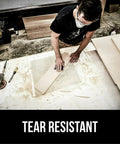 Man using Pro Grade No Slip Sandpaper Sheet 9 By 11 Inch 320 Grit for woodworking and finishing on a workbench