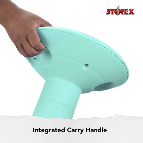 Close-up of teal wiggle stool bottom with built-in carry handle, part of Wiggle Stool For Class And Home Study, Flexible Seating That Moves With You, Adjustable 12 To 18 Inch Height, Teal Cushioned Seat With Built In Carry Handles, Angled Base For Better Posture And Balance.