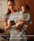 Dream Sock Smart Baby Monitor With Real Time Pulse Rate And Oxygen Alerts Easy Peace Of Mind For Busy Parents And Baby Sleep Insights And Real Time Alerts For Safer Nursery Night And Day. Mother holding baby with phone and sock monitor