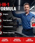 Keep Your Whip Running Slick With This Multifunctional Engine And Fuel Treatment That Dissolves Carbon Buildup Boosts Gas Diesel Power Lubricates Metal Parts For Transmission And Power Steering In A 32 Oz Bottle in a mechanic's hand shown in a workshop.