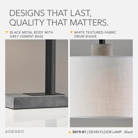 Close-up of Black Floor Lamp With White Fabric Drum Shade, grey cement base, and sleek black frame, showcasing material quality.