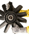 Person wearing Cut Protection Gloves With Intercept Yarn ANSI A2 For Sharp Objects And Debris holds large black industrial fan blade.
