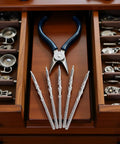 5 Piece Silver Movement Watch Stem Crown Kit For NH Series Movements NH35 NH36 NH38 NH39 on wooden desk with tools.