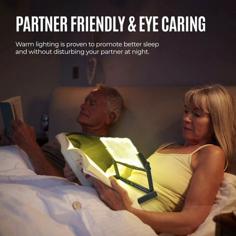 Couple using Rechargeable 5X LED Page Magnifier With Foldable Stand Eye Care Anti Glare Lens in bed at night for reading.