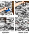 DIY installation of Grey Faux Brick Peel And Stick Wallpaper 17.7 X 393.7 Inches Removable Vinyl Wall Covering for living space.