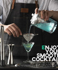 Bartender using 3.3 Inch Fine Mesh Strainer 304 Stainless Steel Cocktail Sieve for crafting blue cocktail at home bar