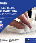 Hand using Disinfecting Wipes With Hydrogen Peroxide Cleaner Fresh Scent 5.75 X 7 Inches on a countertop, kills bacteria