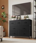 No-Fuss Seven Drawer Fabric Dresser With Bonus Storage Bins For Bedroom Organization And Durable Wooden Top in stylish modern bedroom.