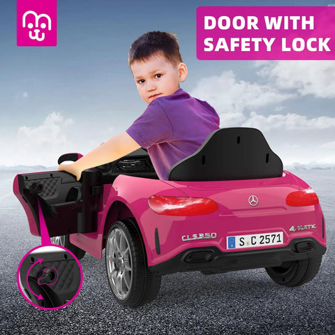 Child sitting in a 12V Licensed Kids Ride On Electric Car With Remote Control, Pink Battery Powered Toddler Roadster with safety lock shown.