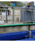 Ultrasonic Liquid Flow Meter For Open Channel And River Water installed with non-contact flow sensor on blue tiled surface.