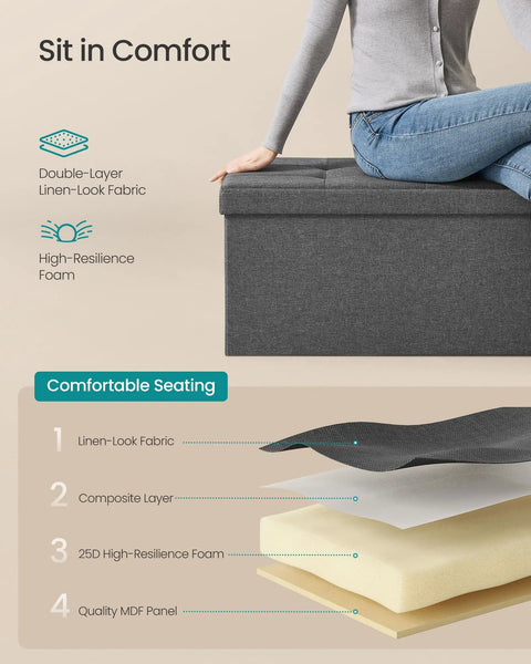 Woman sitting on Mazie Collection 43 Inch Folding Storage Ottoman Bench With Quick Foldaway End Of Bed Foot Rest And Underbed Storage Go-To For Living Room Bedroom Or Entryway Dark Gray showing seat layers.