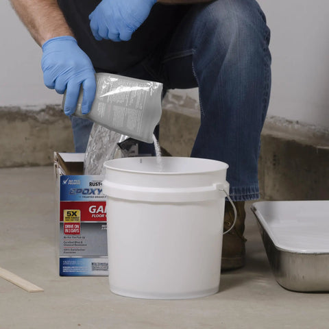 Anti-Skid Additive With Aluminum Oxide Formula To Boost Slip Resistance In Epoxy Latex Or Oil-Based Paints And Stains, 3.4 oz poured into a white mixing bucket.