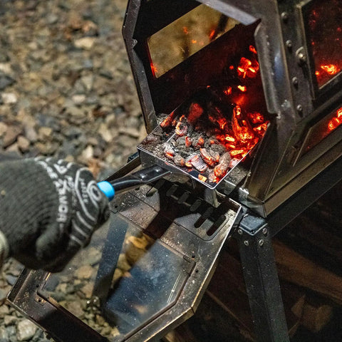 Heavy Duty Wood Stove Ash Shovel With 14.6 Inch Rust Resistant Blade blue handle scooping ashes from wood stove fire pit