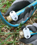Hands holding All Metal Garden Hose Repair Connector Kit with Aluminum Mender Fittings for Five Eighths Inch Hose Ends