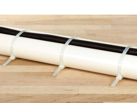Heavy Duty 6 Inch Releasable Cable Ties In Natural Nylon Built For Everyday Grind Featuring A Rock Solid Forty Pound Grip Perfect For No Sweat Wire Organization And Pro Grade Projects Pack Of One Hundred securing black and white pipes.