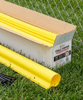 Premium Fence Topper 50 Ft Yellow Chain Link Fence Cover with box and zip ties on grass by fence