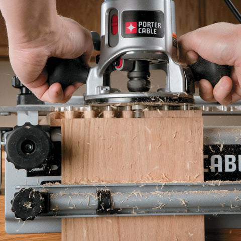 Close-up of Deluxe 12 Inch Dovetail Jig For Woodworking And Cabinet Making Pro Grade Router Jig Kit in use with wood.