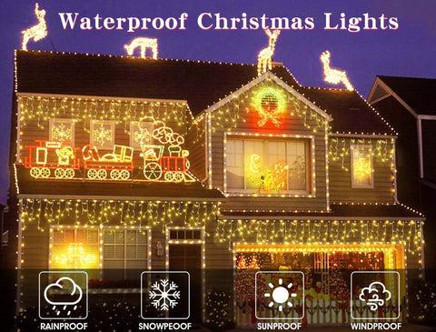 House decorated with Outdoor Icicle Christmas Lights With 1008 LEDs, 98.4 Ft Warm White Drops on eaves and facade.