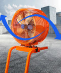 Heavy Duty 24 Inch Industrial Floor Fan Moves A Ton Of Air With Full Oscillation And Adjustable Tilt For Fast Shop Warehouse Garage Cooling Setup, showing oscillation in outdoor setting.