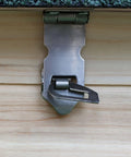 Close-up of hinged locking mechanism on No Sweat Wooden Chicken Coop With Hinged Nesting Box And Removable Egg Tray featuring sturdy metal.