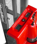 Mechmaxx 3300 Lb Electric Lithium Ion Straddle Stacker With 98 Inch Lift Height And Adjustable Legs Forks 24V Battery control panel and battery compartment close-up.