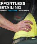 Hand using yellow microfiber towel on car seat, demonstrating cleaning process. Text: Effortless Detailing, Achieve a Pristine Clean Look.
