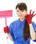 Person in blue uniform holding a pink broom and making an OK sign, related to Ten Pack Wall Mount Organizing Spring Clamps For Tools, Rakes And Brooms With Handy Multi Tool Holder For Garage Or Shop Storage And Grab And Go Access Anywhere.
