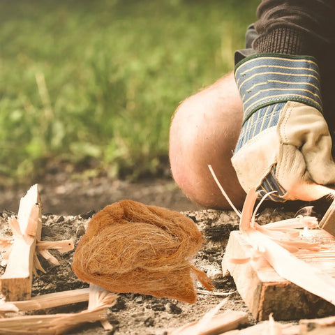 Person using 4 Piece Jute Flame Starters Quick Ignition Reusable Outdoor Fire Starters for Camping Gear with wood shavings