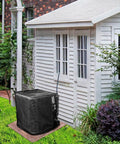 All Season Outdoor AC Unit Cover For Outdoor Condenser Protects Against Leaves Debris Cottonwood Fluff And Grass Clippings Durable PVC Coated Polyester Washable Weatherproof Fits 35.4 By 35.4 By 39.4 Inches covering outdoor AC unit in garden