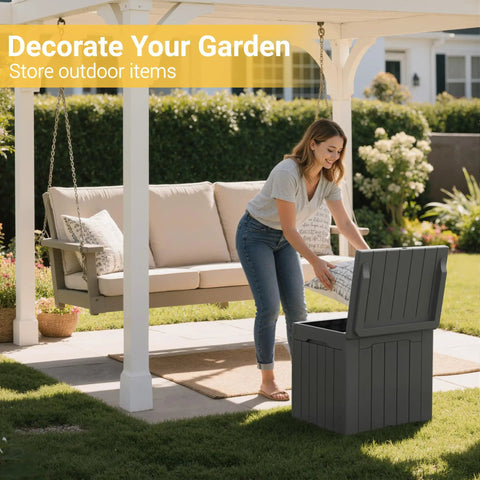 Woman placing cushion in Big 31 Gallon Outdoor Storage Box With Lid For Patio Furniture, Garden Tools, And Pool Supplies, Weatherproof, UV Resistant, Lockable, Dark Grey, Heavy Duty Outdoor Organizer.